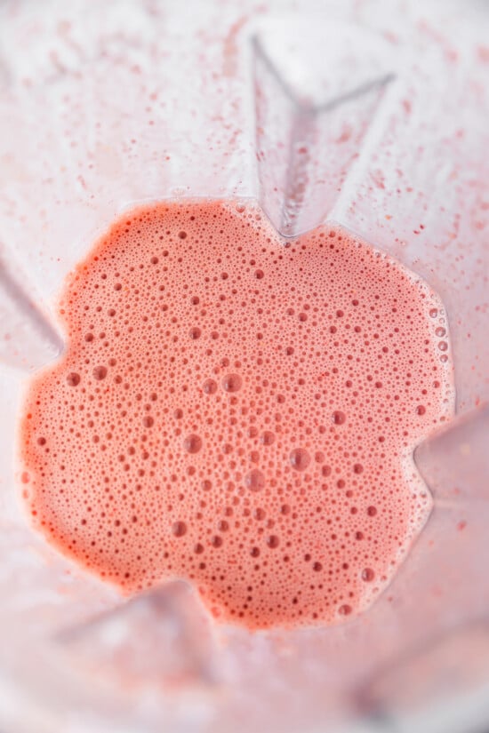 Blend strawberries and milk.