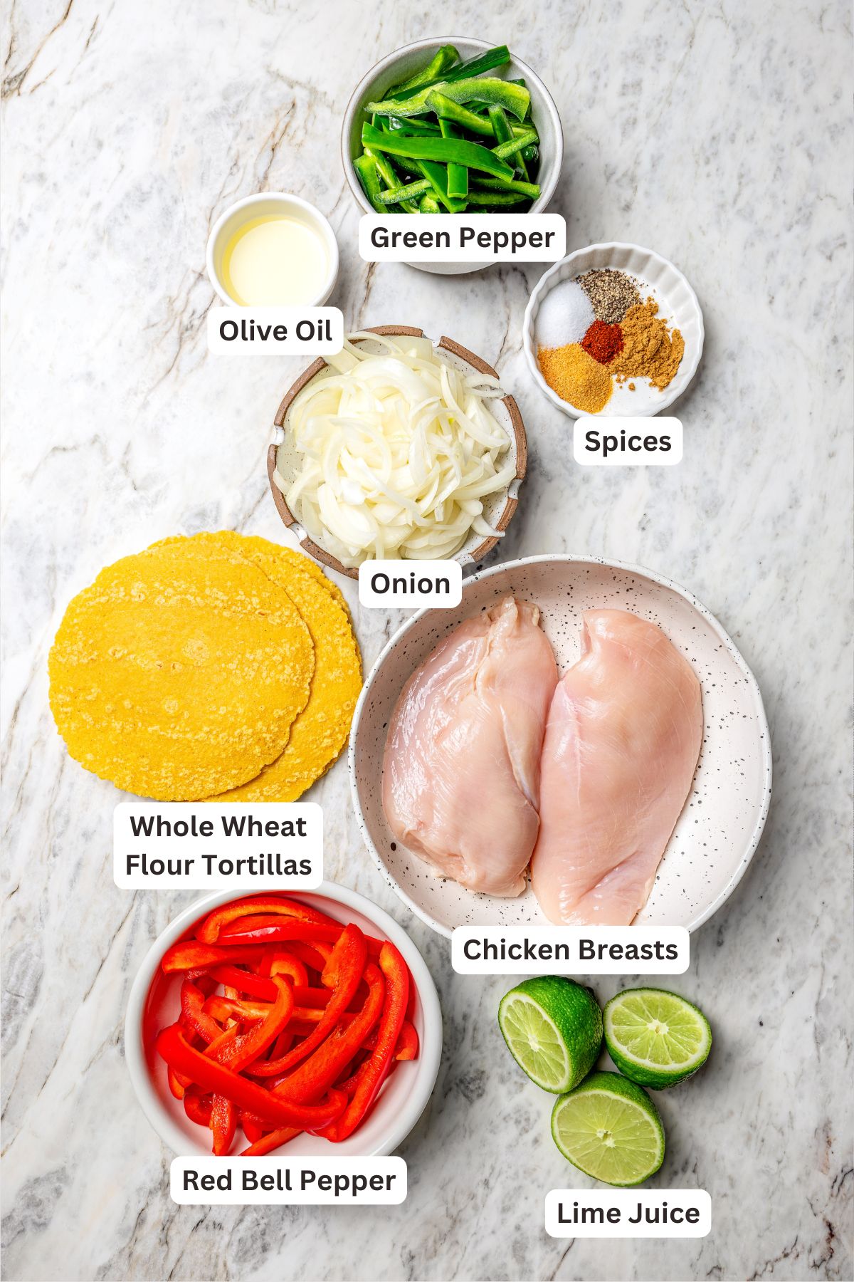 Overhead view of ingredients for chicken fajitas