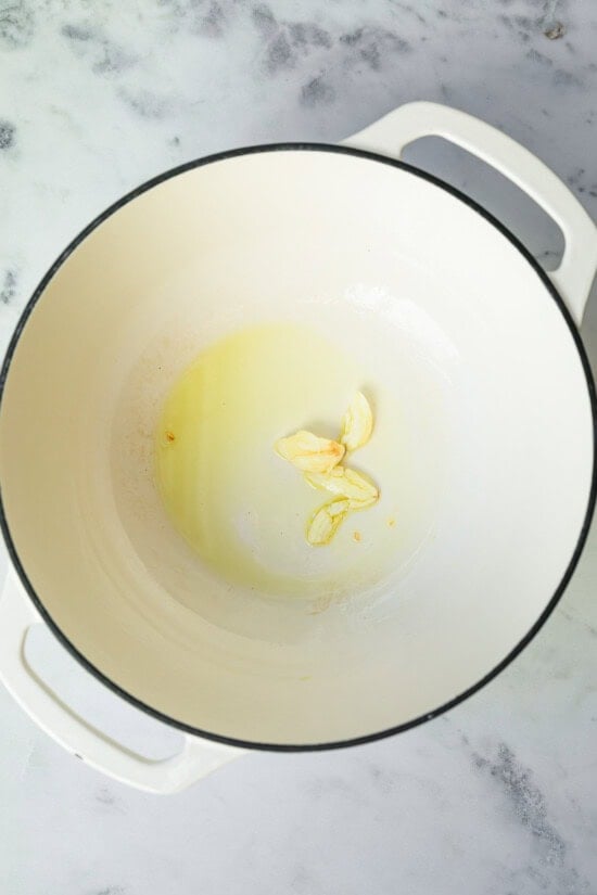 Pot with garlic and oil.