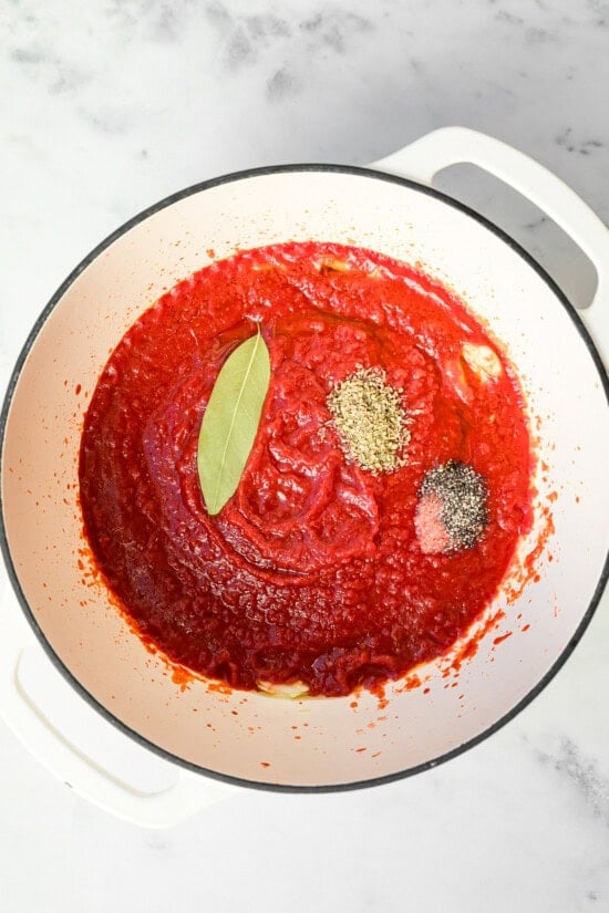 Pot with marinara ingredients.