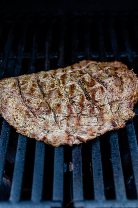 Season the steak and grill
