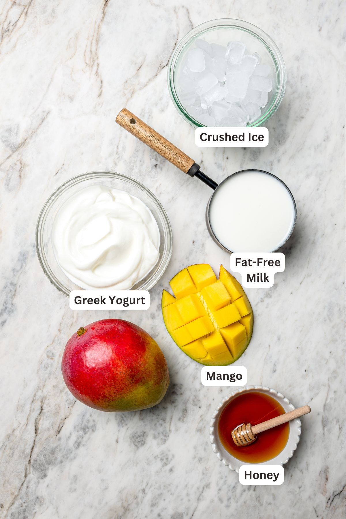 Overhead view of ingredients for mango lassi