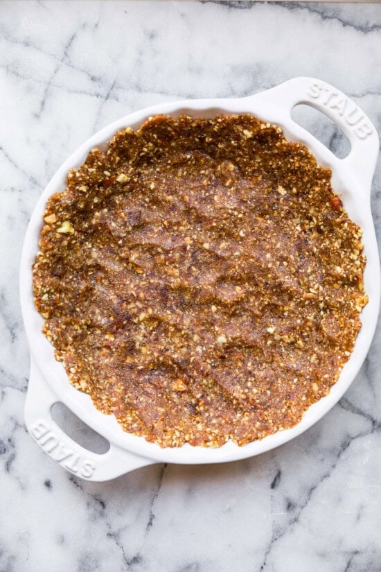 Press date nut mixture into the pie dish