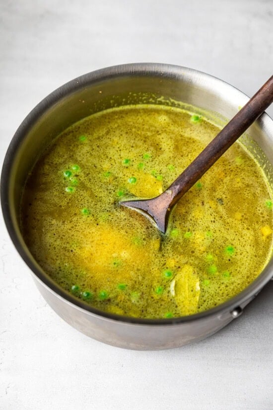 Add liquid, rice and seasoning