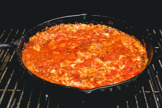 Grill until tender, hot and melted