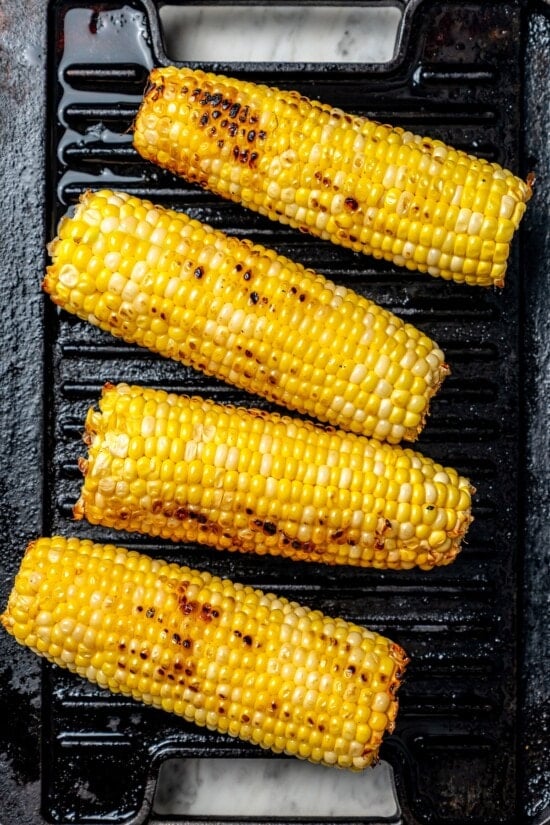 Overhead view of corn on grill pan