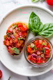 Bruschetta with Tomato and Basil, one of my favorite way to use up my summer tomatoes is with this simple appetizer or side dish.