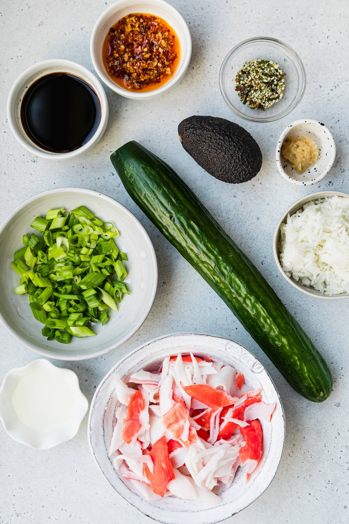 California Roll ingredients with rice and cucumber