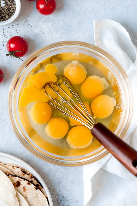 Whisking eggs for migas