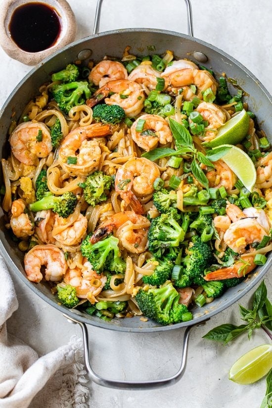 Drunken Noodles with Shrimp in a wok