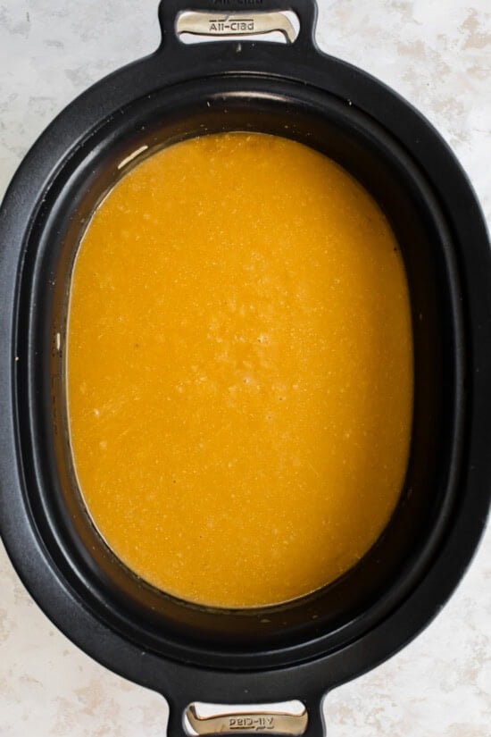 A cozy butternut squash cheddar soup in the slow cooker