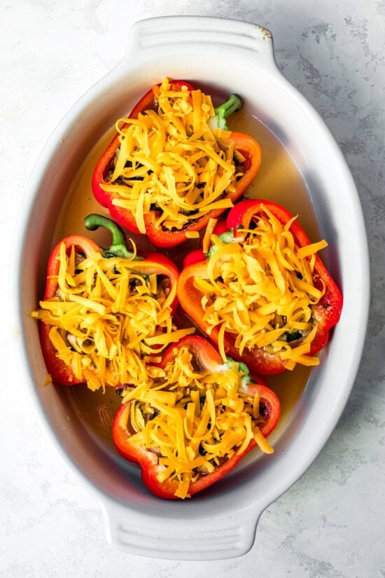 Stuff the peppers and top with cheese