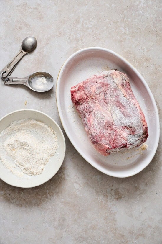 Rub the beef with some of the flour and brown