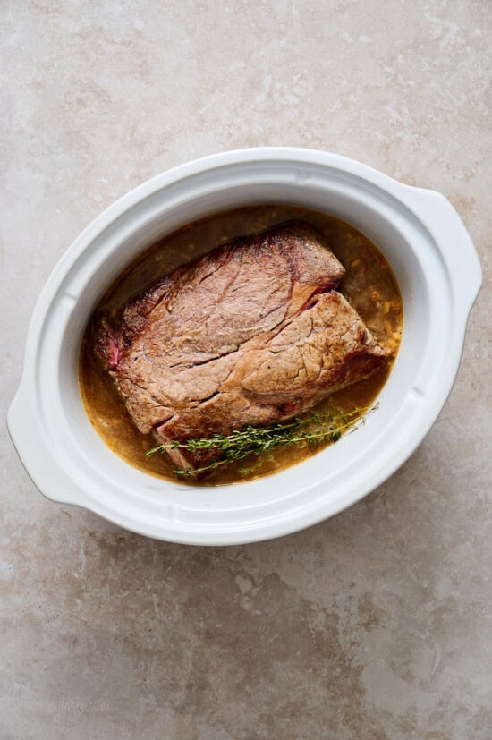 Transfer to the slow cooker or Dutch oven and cook until tender