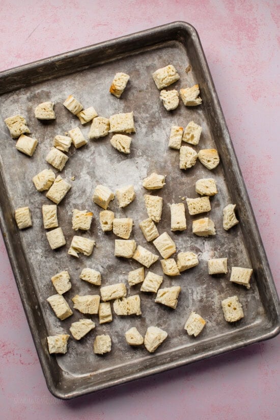 bread chunks on sheet pan