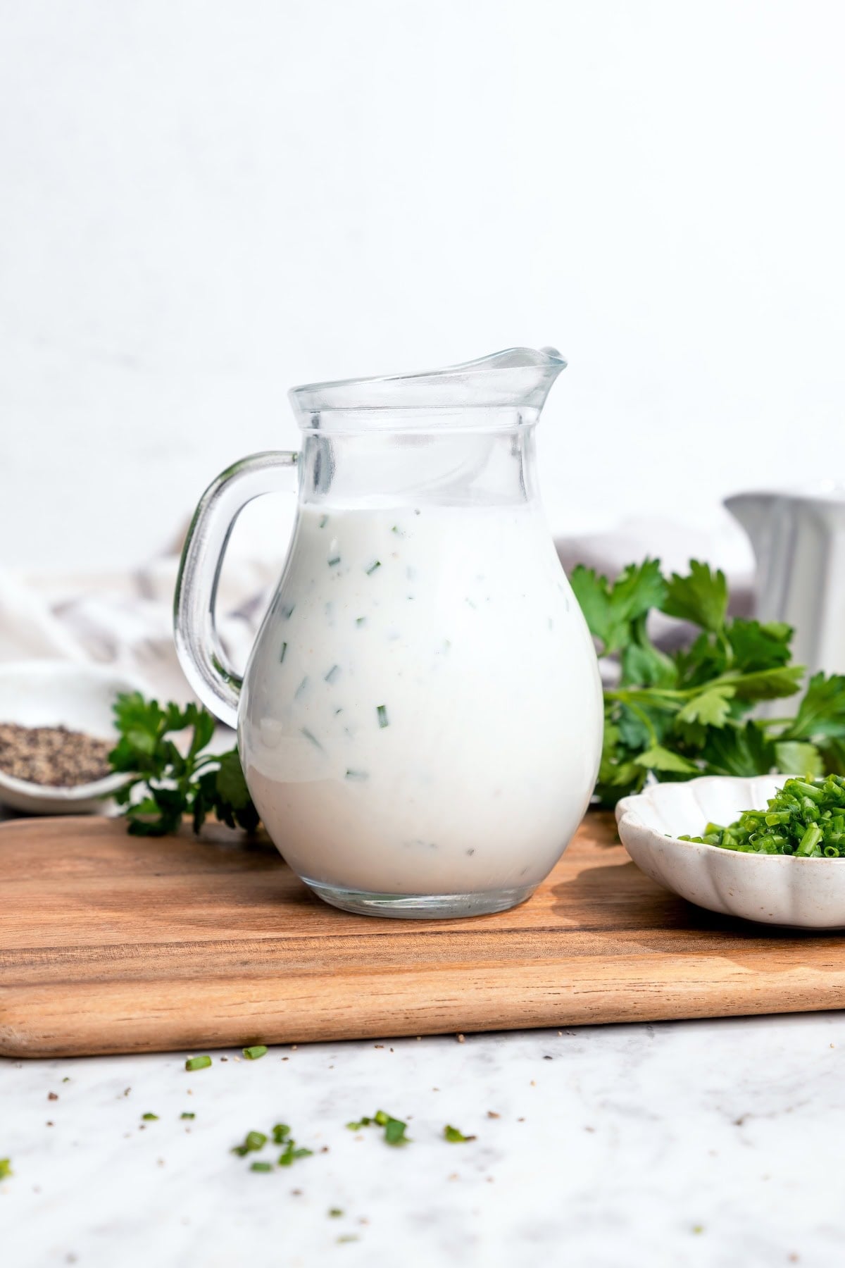 Pitcher of buttermilk ranch dressing.