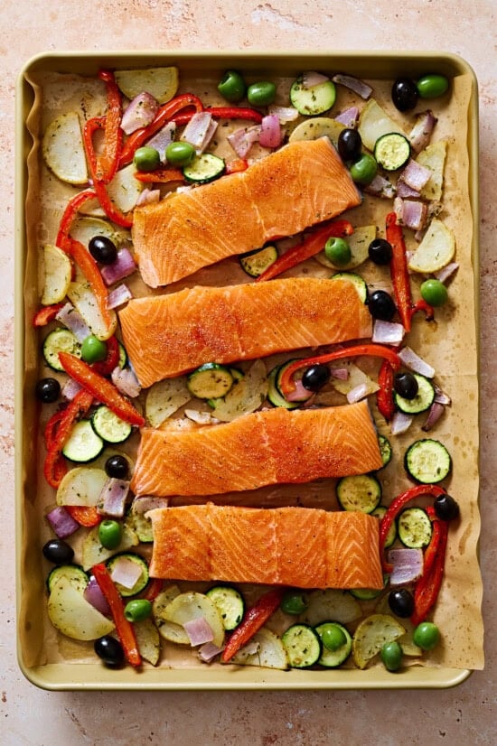 Add the salmon to the sheet pan with the vegetables