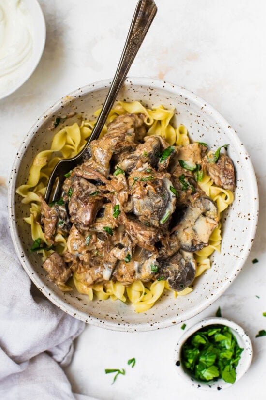 Slow Cooker Beef Stroganoff over noodles