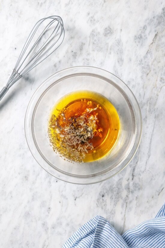 Ingredients for Greek salad dressing in bowl.