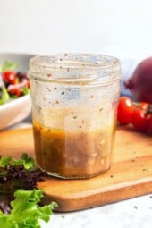 Jar of Greek salad dressing.