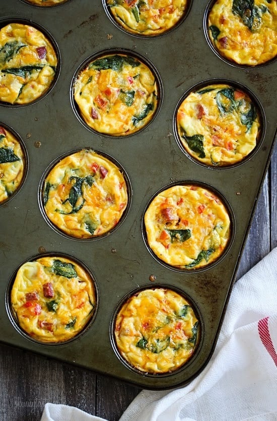 These petite crustless quiches are SO good, loaded with turkey kielbasa, veggies and cheese. A perfect make-ahead breakfast for meal prep and naturally gluten free!