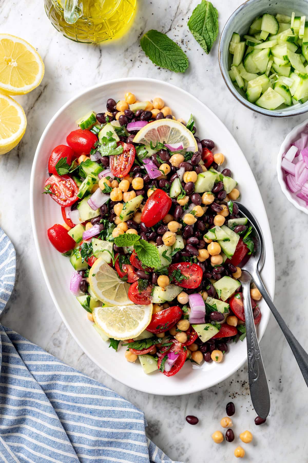 Garbanzo bean Mediterranean salad on serving platter.