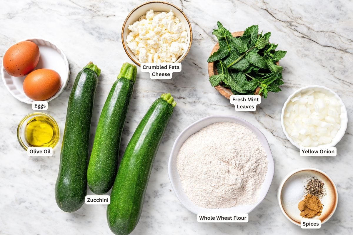 Ingredients for zucchini fritters with feta and mint.