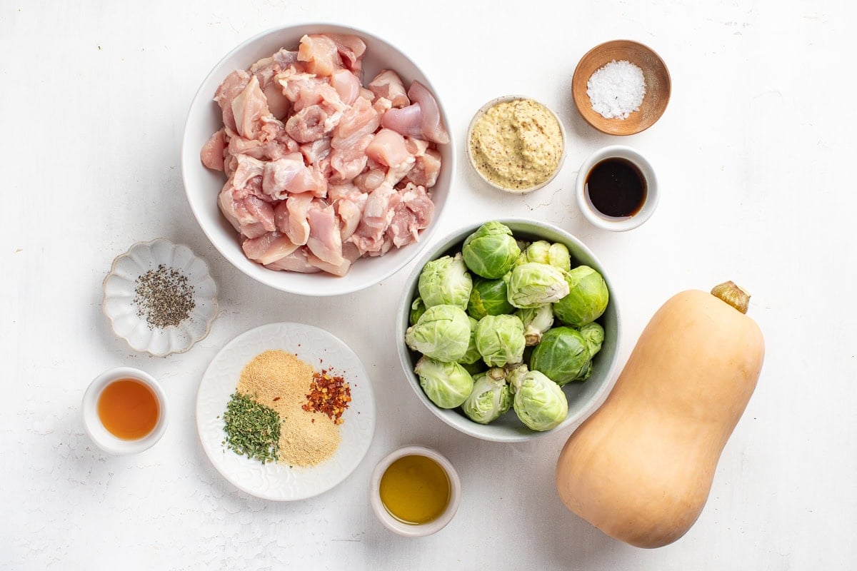 Maple Dijon Sheet Pan Chicken with butternut squash and brussels sprouts.